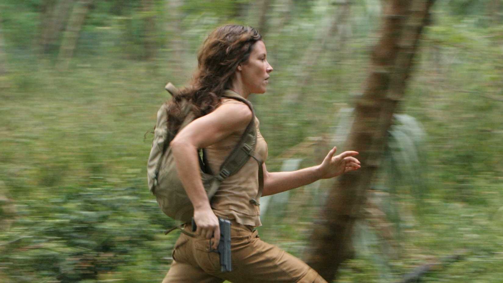 Evangeline Lilly runs through the jungle in Lost