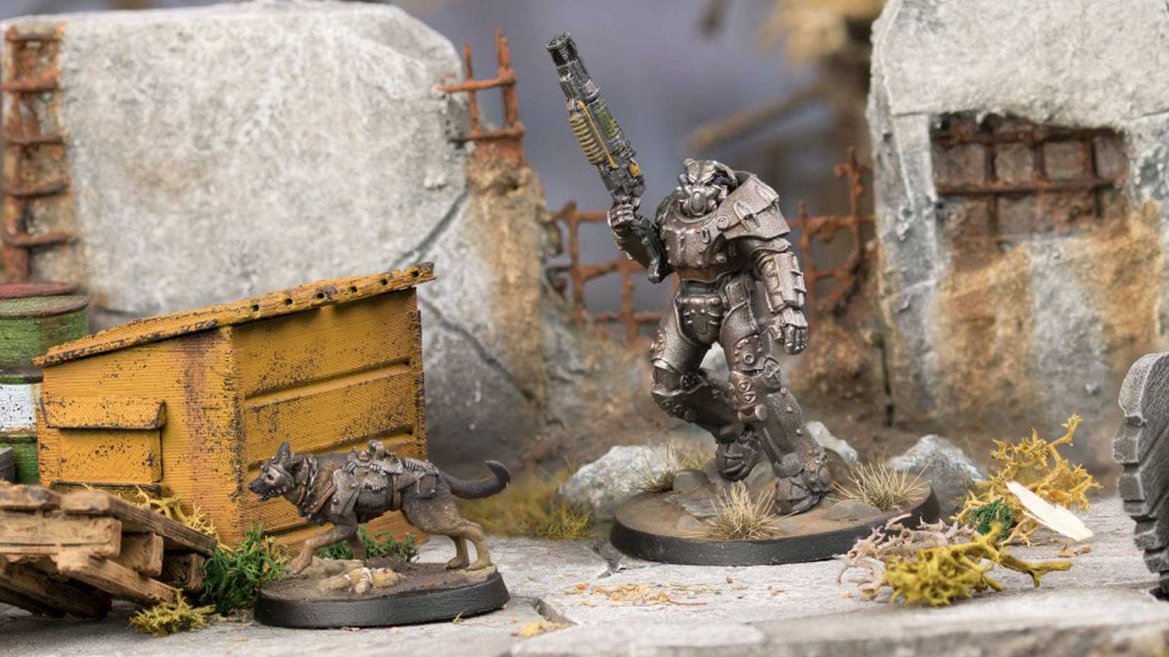 Two miniatures in an environment in Fallout Wasteland Warfare.