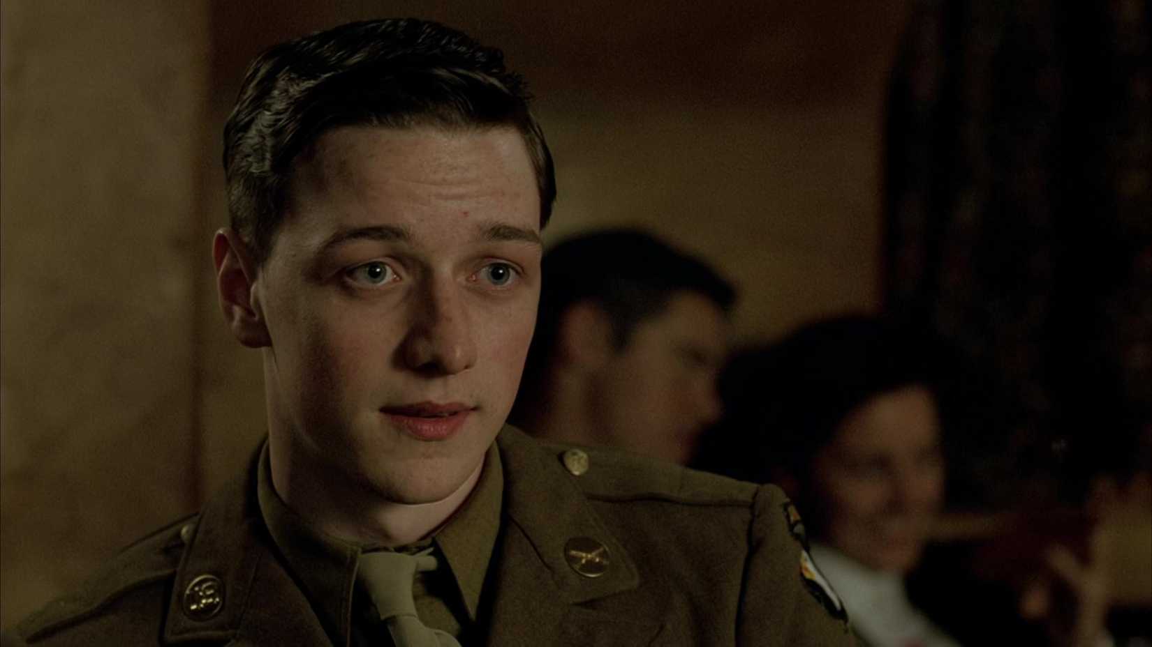 Private James W. Miller talks to someone in Band of Brothers