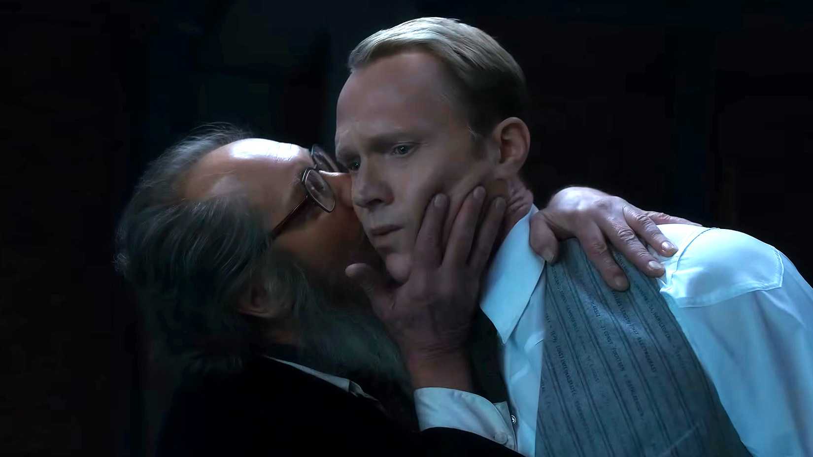 James Spader's Ultron kissing Paul Bettany's Vision on his cheek in Visionquest