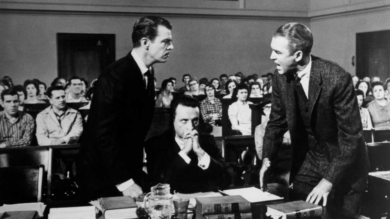 James Stewart as Pauly arguing aith Brooks West as Mitch over George C Scott as Claude in Anatomy of a Murder