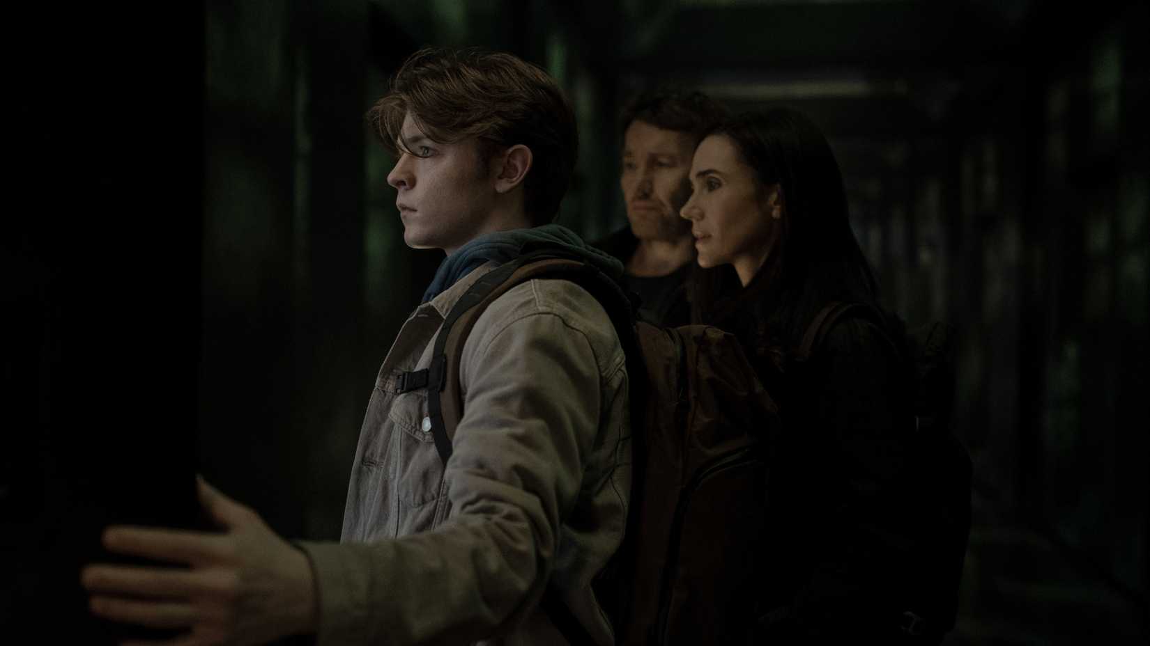 Jason, Daniela, and Charlie look through a door in Dark Matter season 2