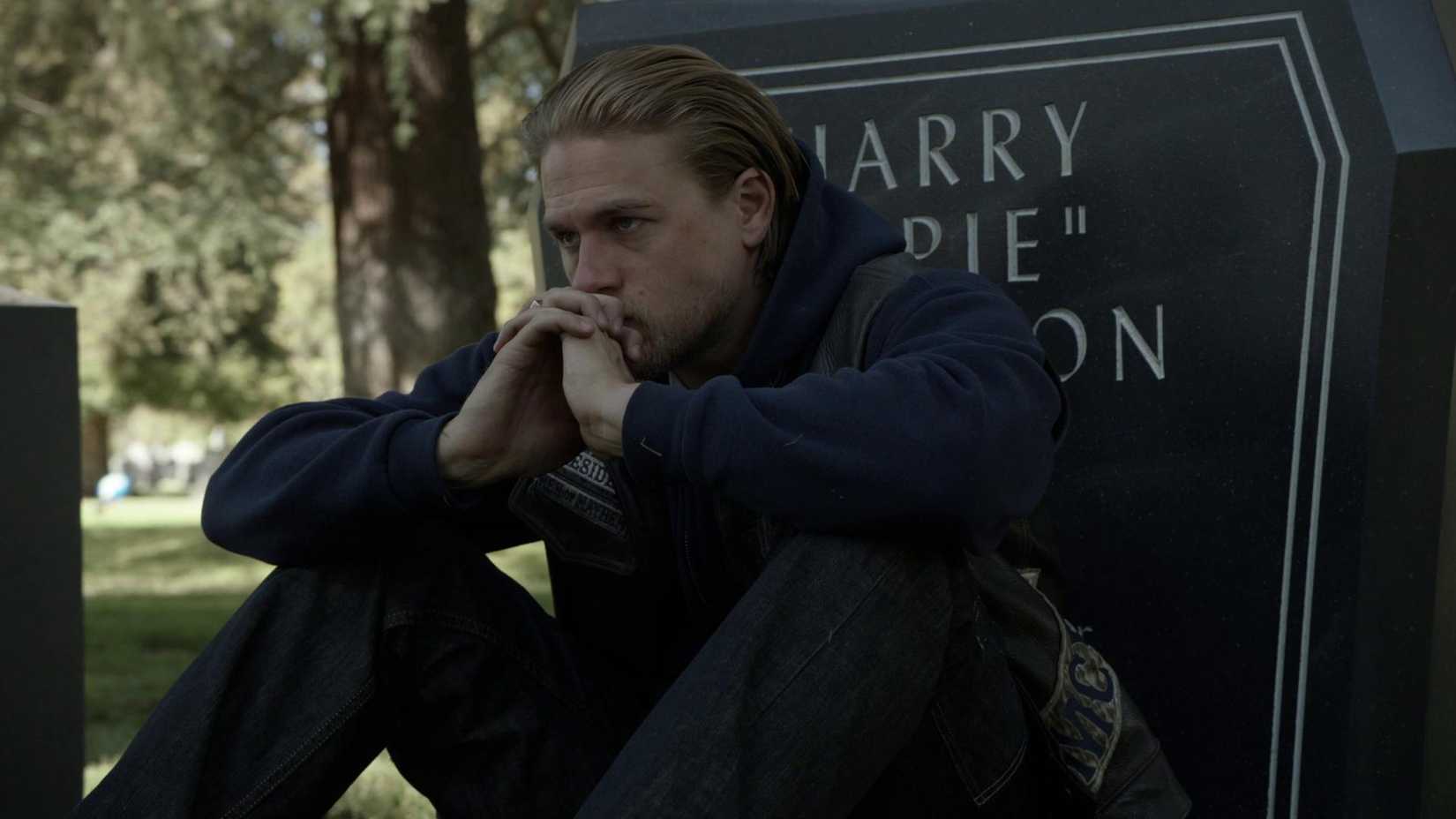Jax sitting at Opie's grave in season 6 finale of Sons of Anarchy