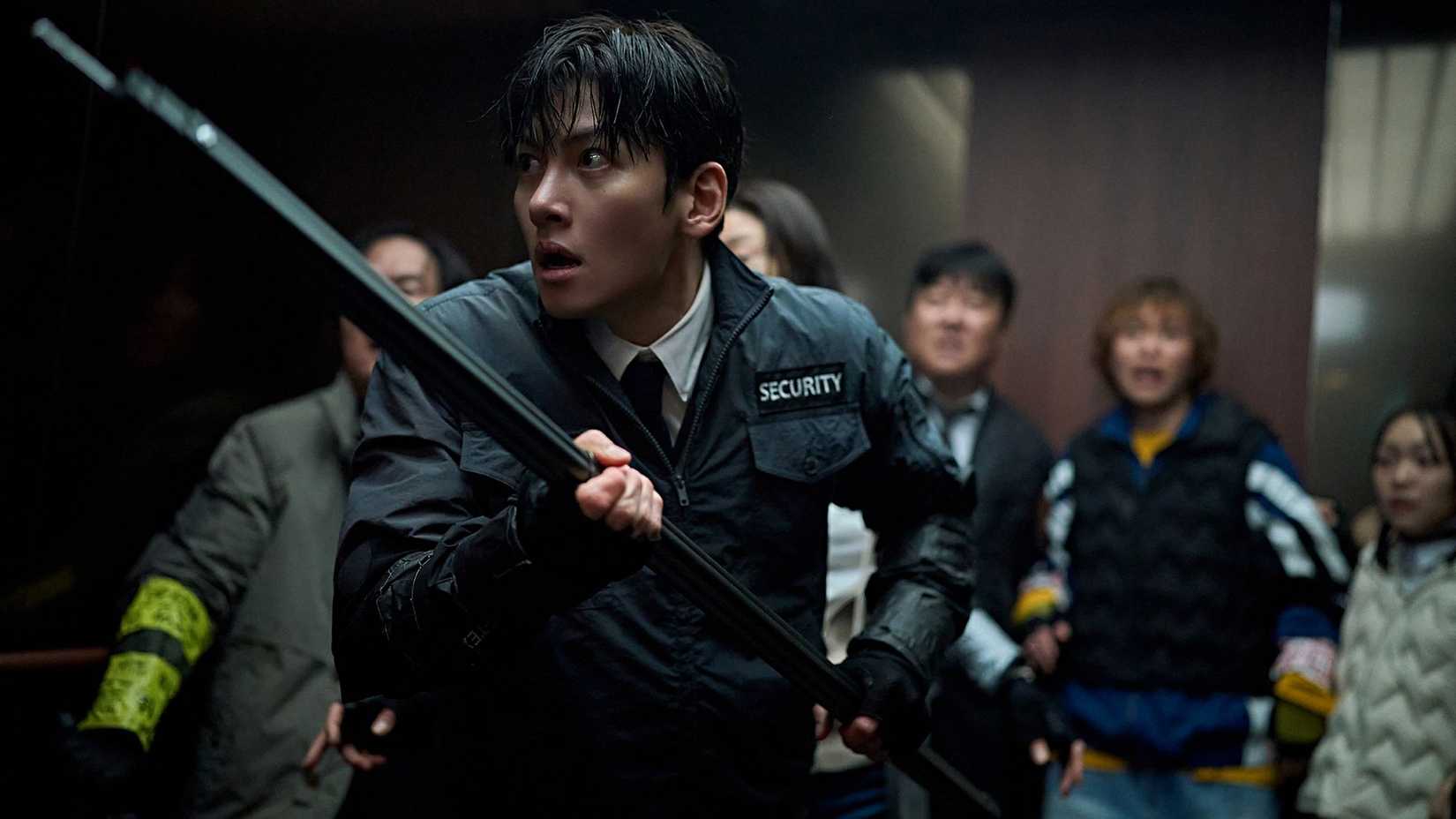 Ji Chang Wook holding a pole and looking scared in Colony
