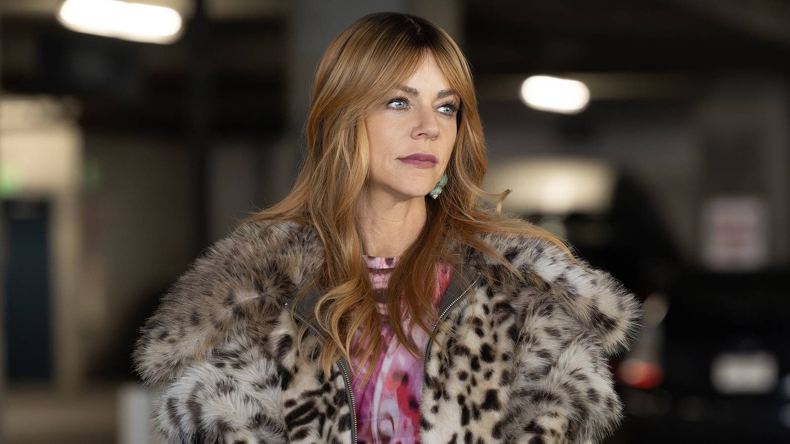 Kaitlin Olson in a still from High Potential season 2, episode 18, as she looks to the side while wearing a coat