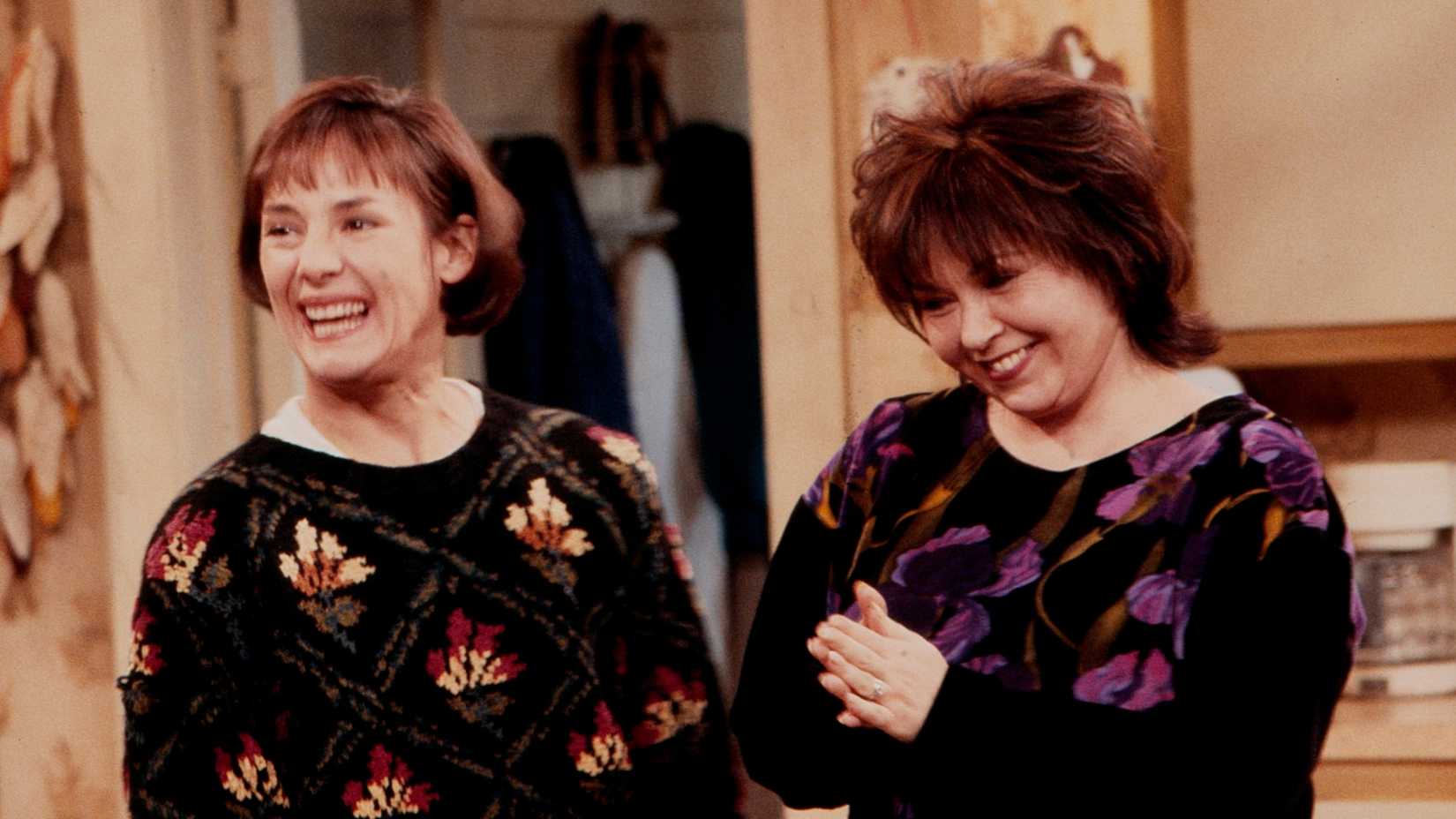Jackie and Roseanne smiling and laughing in Roseanne