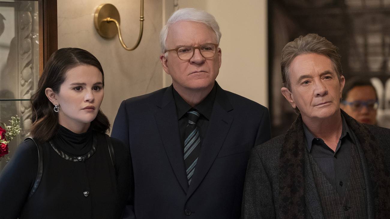 Mabel, Oliver, and Charles standing together in a still from Only Murders season 5