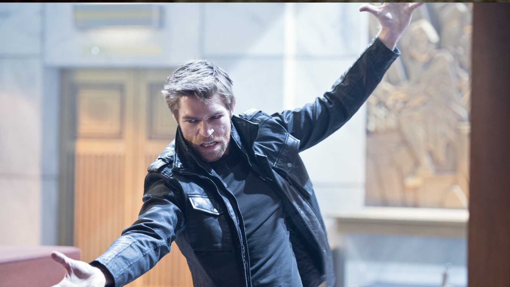 Mark Mardon has his arms stretched out in a dramatic way in The Flash season 1, episode 15, "Out of Time"