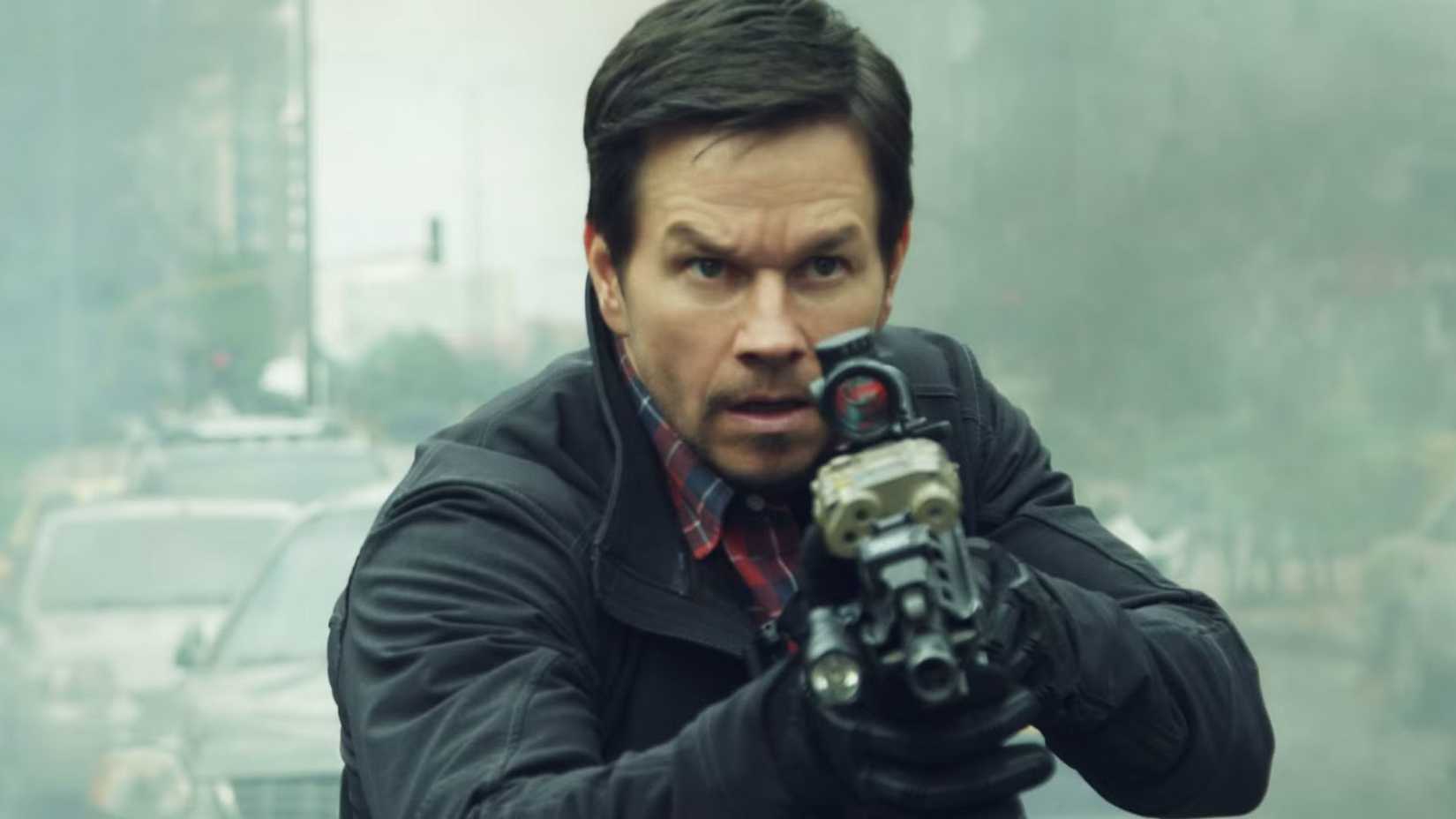 Mark Wahlberg as James Silva with a gun in Mile 22