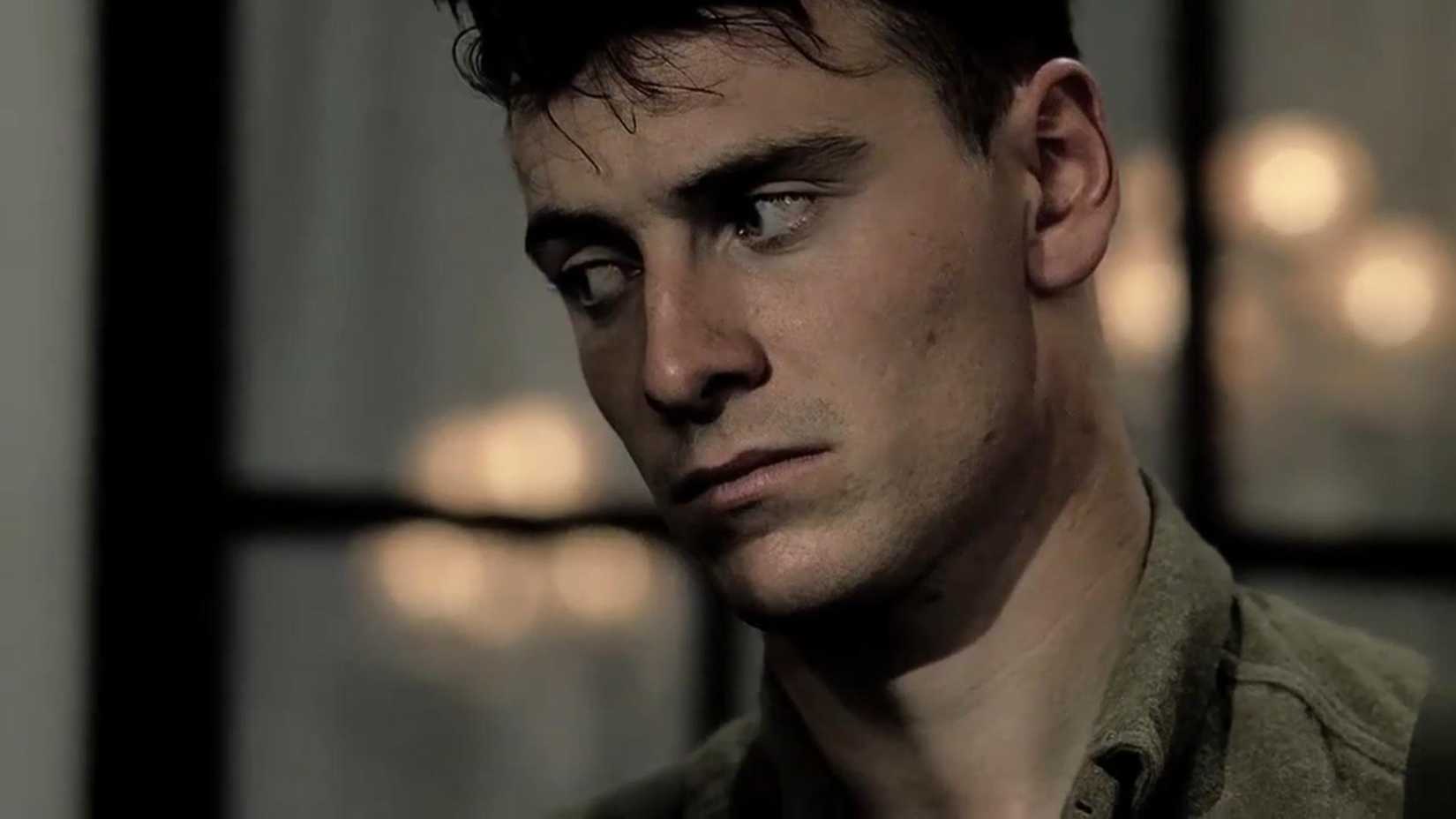 Michael Fassbender looks upset in Band of Brothers