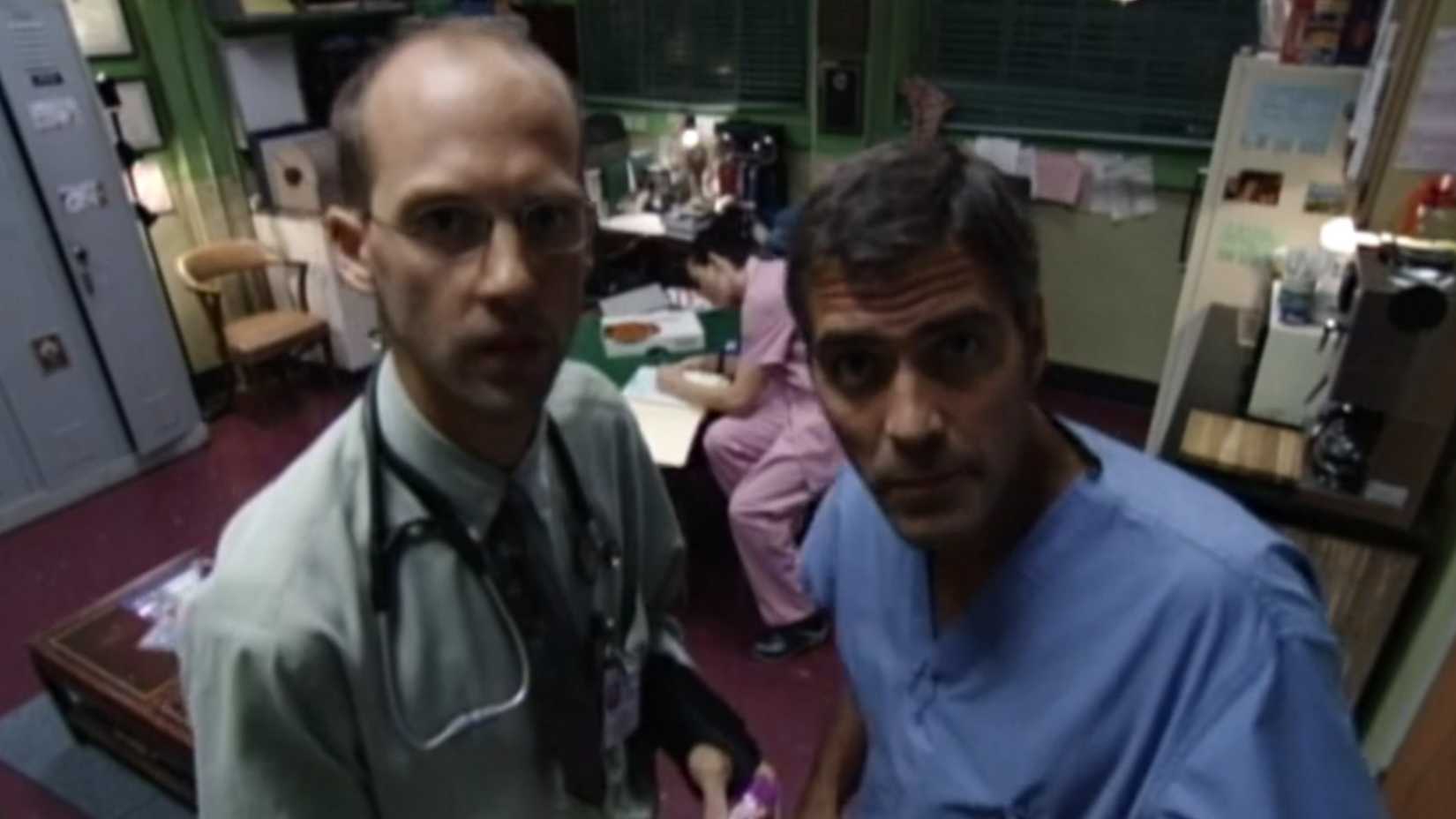 Mark and Doug looking at a documentary camera in ER season 4