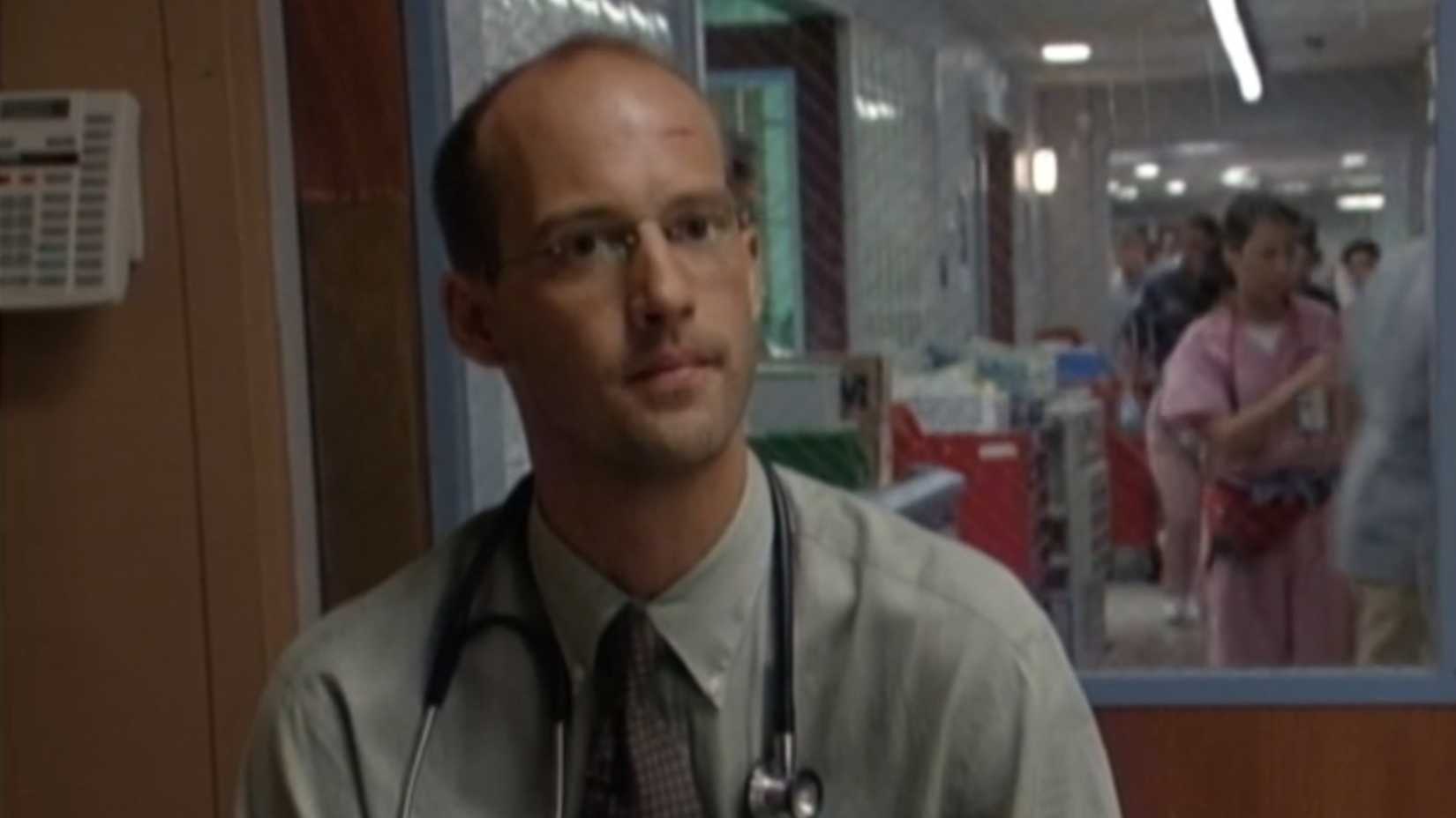 Dr. Mark Greene giving an interview in ER season 4