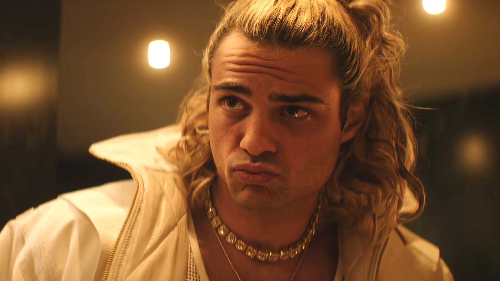 Noah Centineo's Ken posing in front of a mirror in Street Fighter
