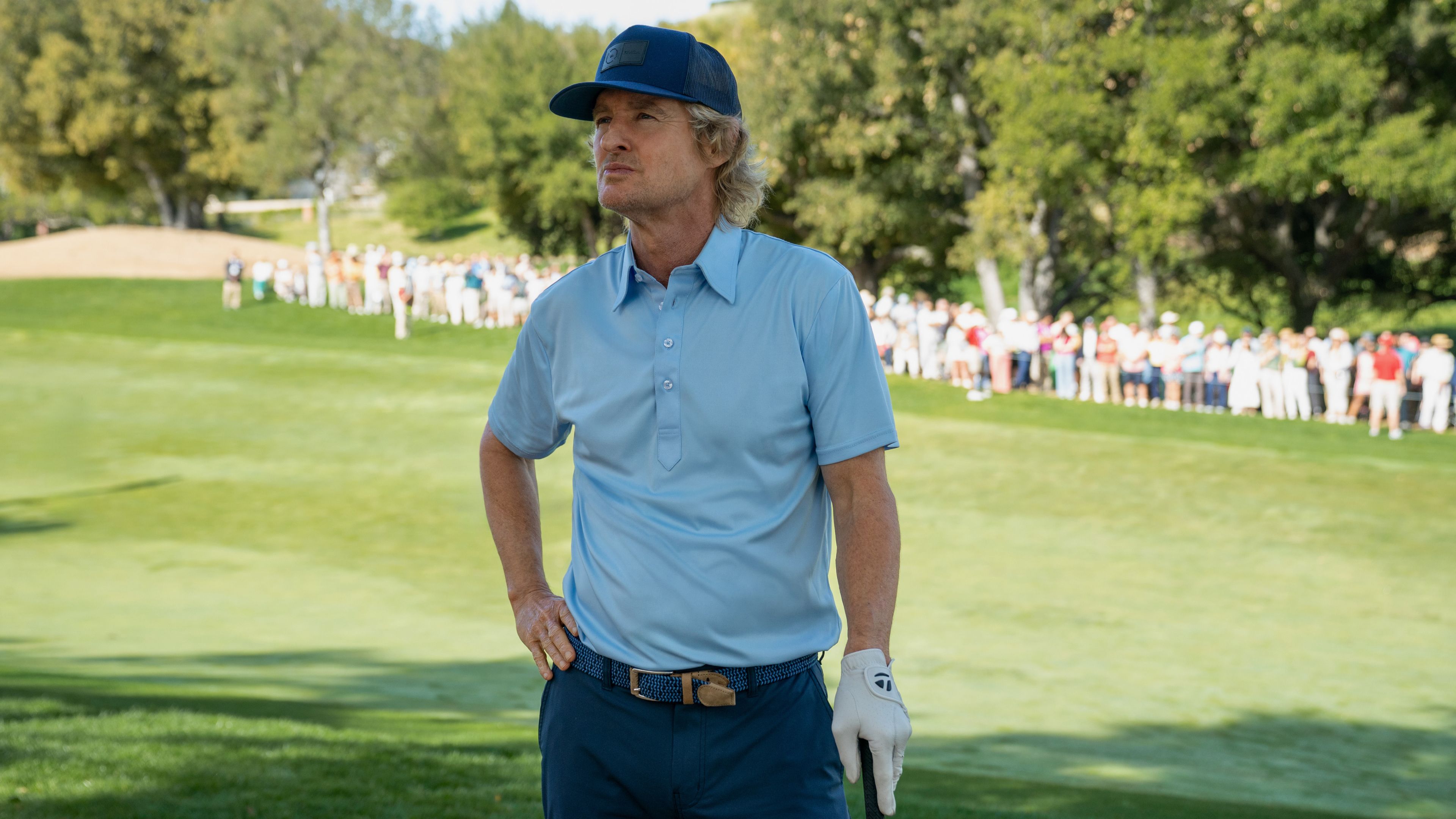 owen-wilson-as-pryce-cahill-on-the-golf-course-in-stick-season-2 Timothy Olyphant's Hit 10-Part Apple TV Series Keeps Getting Better Ahead Of 2026 Return