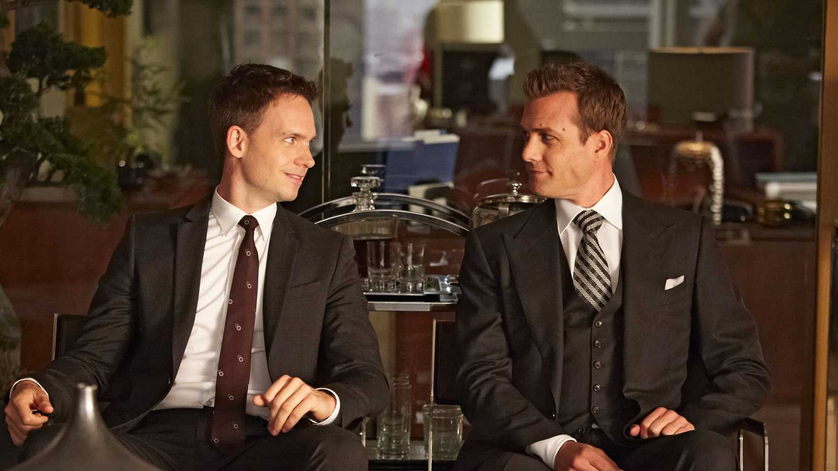 Patrick J. Adams as Mike Ross and Gabriel Macht as Harvey Specter in Suits