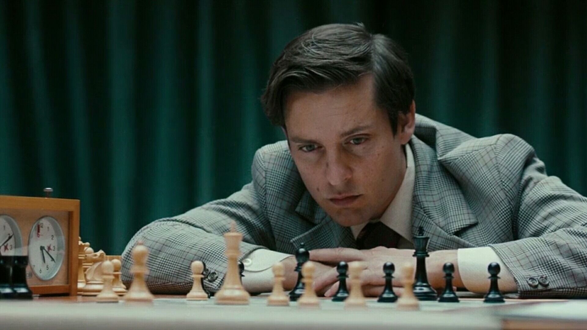 Tobey Maguire As Bobby Fischer In Pawn Sacrifice Looking At The Chess Board