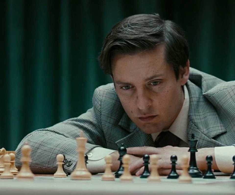 Tobey Maguire As Bobby Fischer In Pawn Sacrifice Looking At The Chess Board