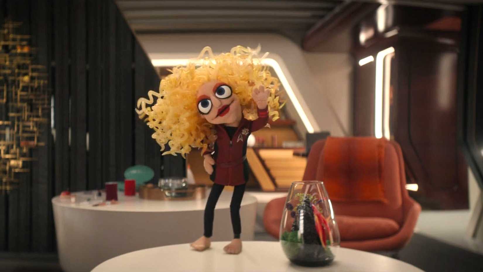Pelia puppet on table