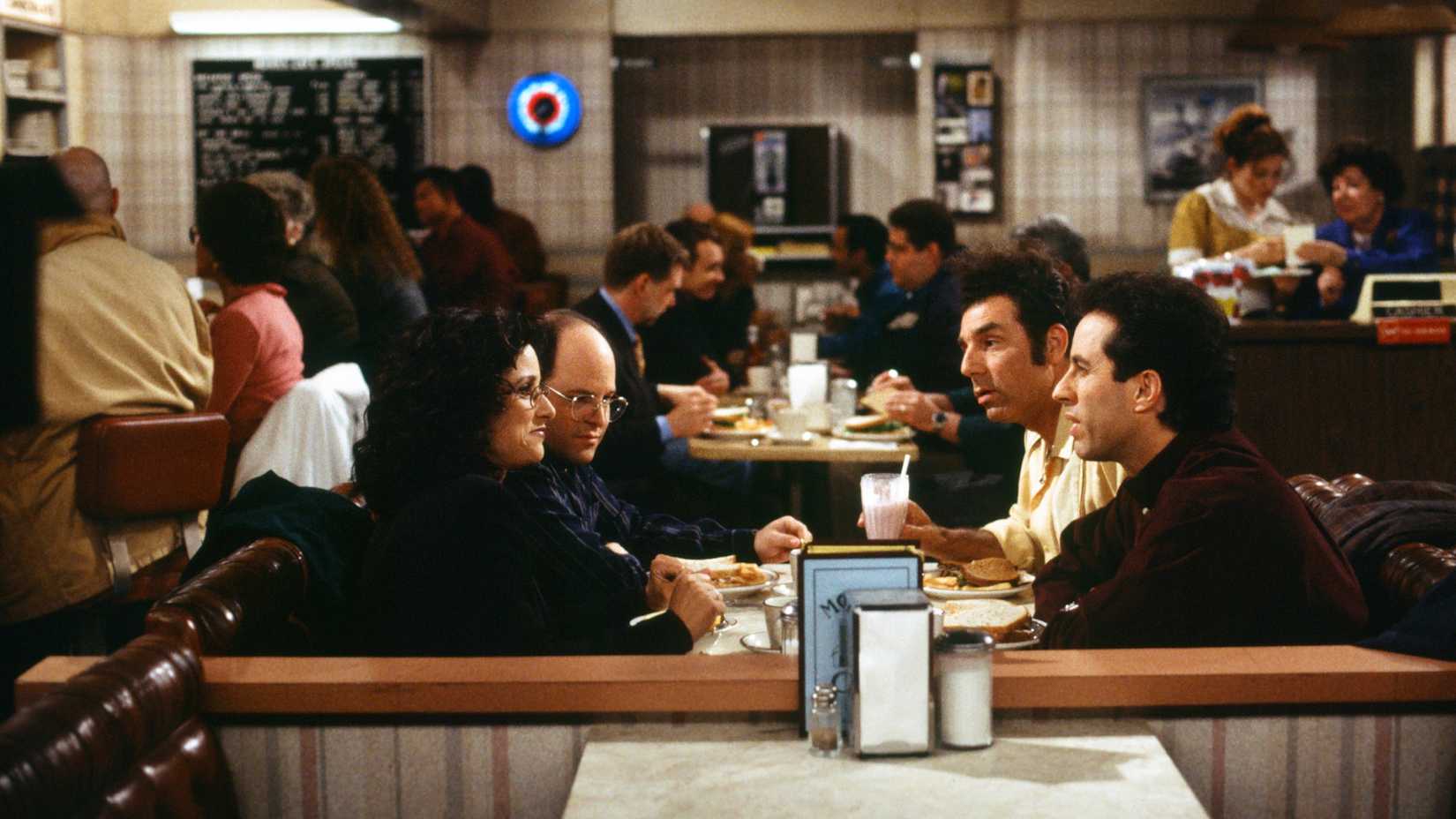 Still of Jerry Seinfeld as Jerry Seinfeld, Michael Richards as Kramer, Jason Alexander as George Costanza, and Julia Louis-Dreyfus as Elaine Benes in Seinfeld.