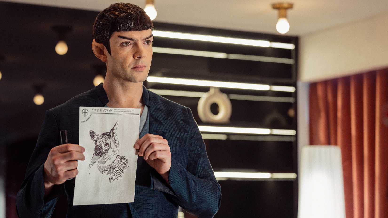 Spock holds up kitten photo