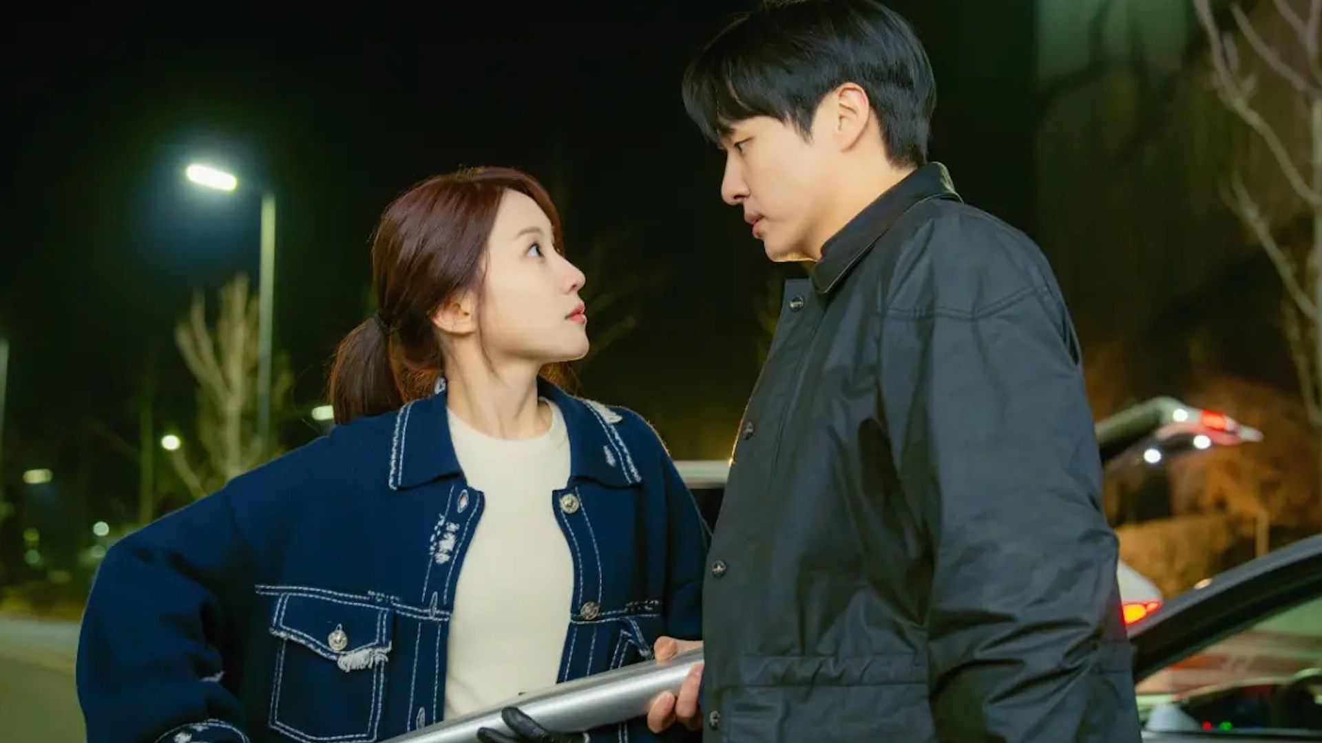 A man and woman both hold a metal bat in the Netflix K-drama Spooky in Love.