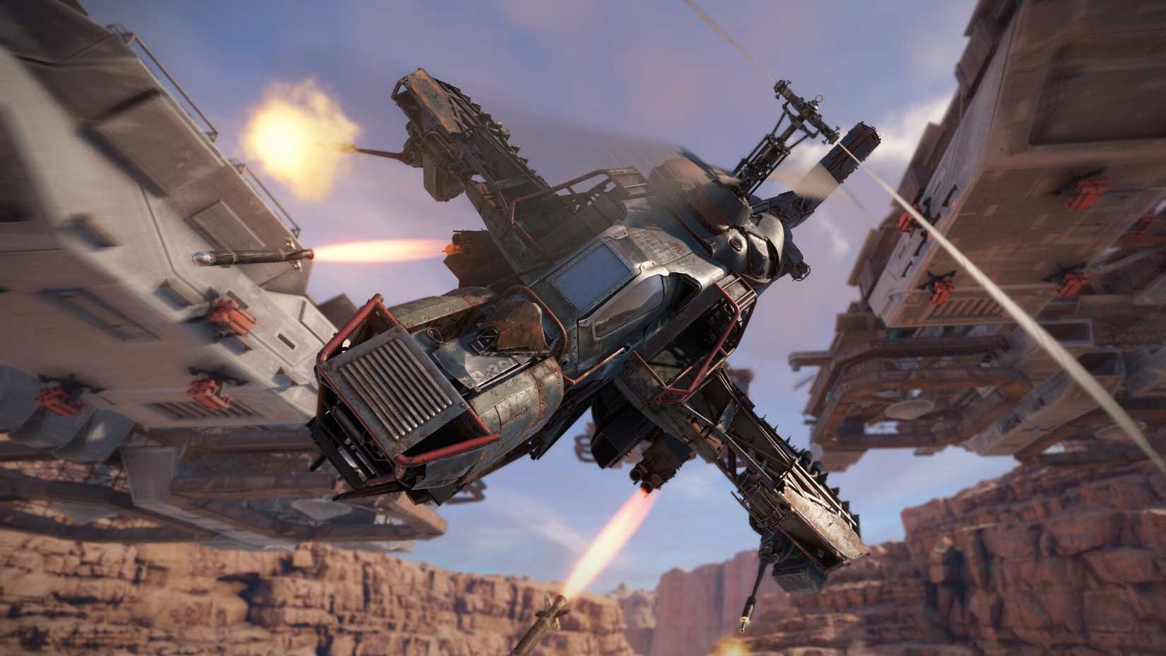 A helicopter in the sky, firing missiles towards an out-of-sight target. 