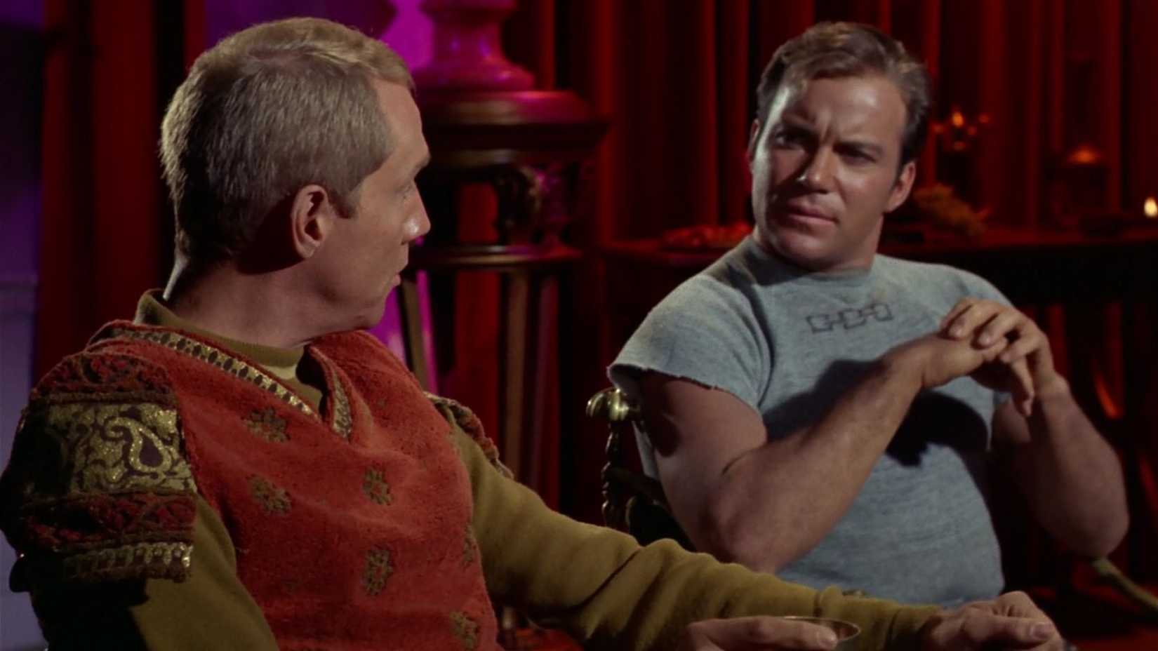Kirk talks to another man in the Star Trek episode Bread and Circuses