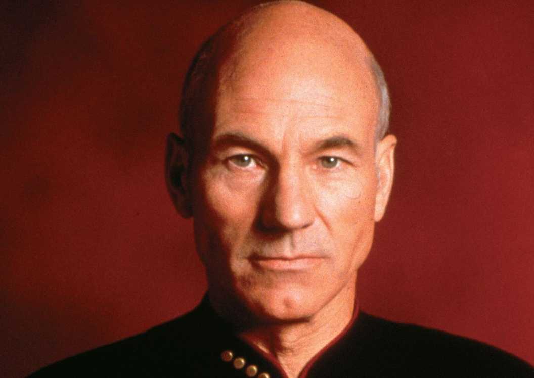 Picard (Patrick Stewart) staring at the screen in Star Trek: The Next Generation.