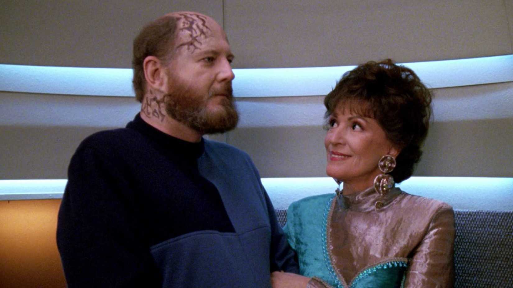 Lwaxana Troi flirts with a man in Star Trek The Next Generation