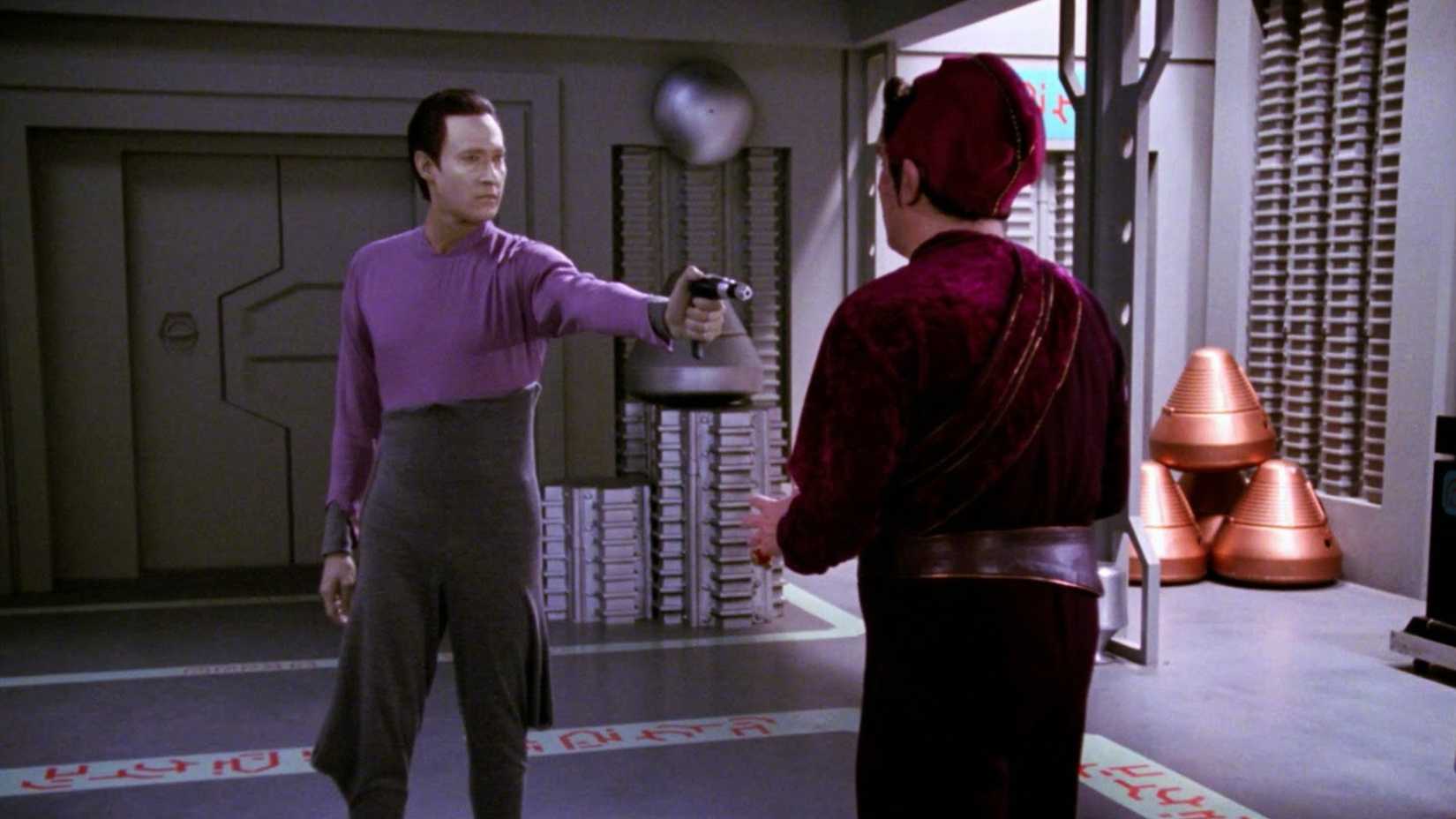 Data points a gun a Fajo in Star Trek The Next Generation