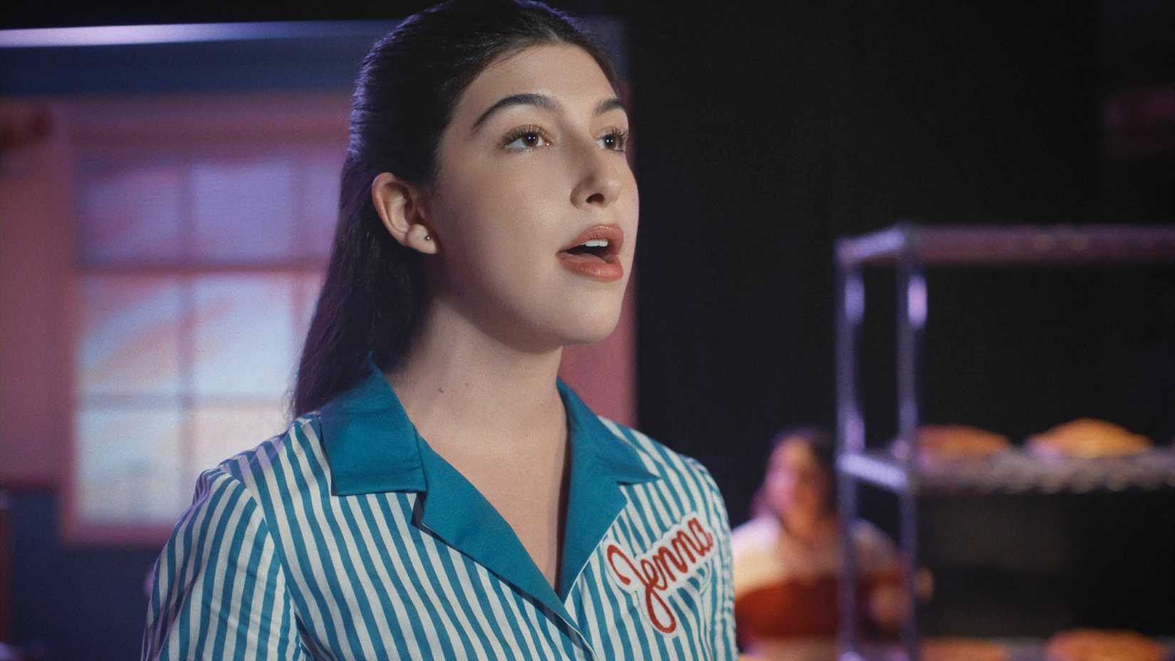 Sunny Sandler singing in Don't Say Good Luck