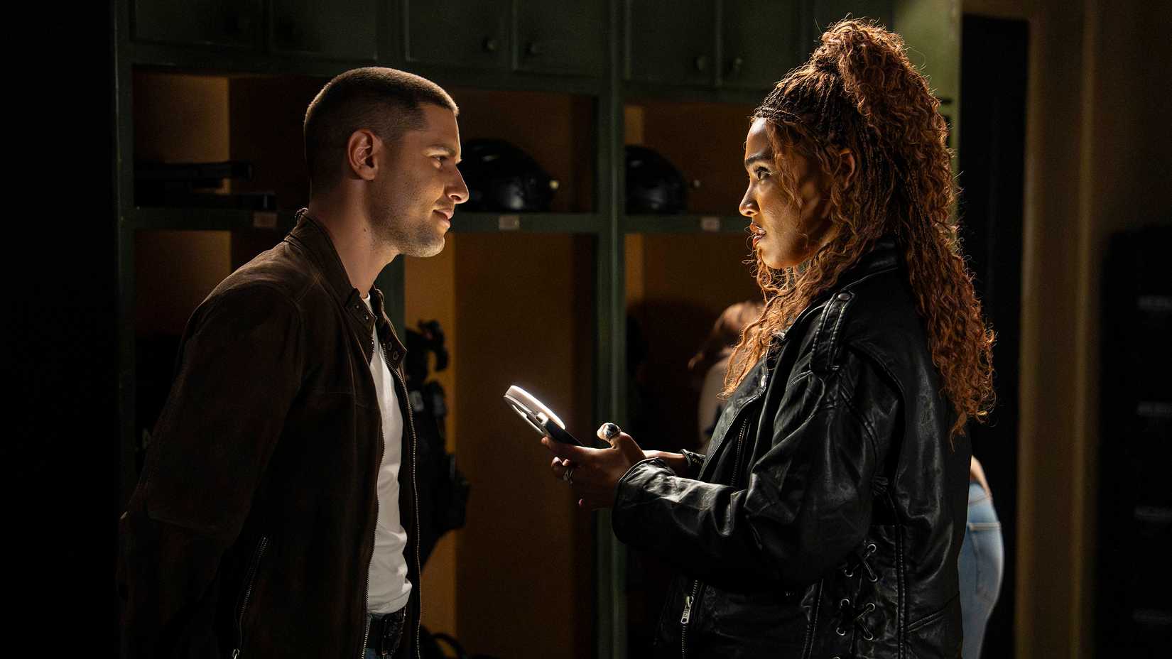 Still of Ronen Rubinstein and Lucy Barrett in SWAT Exiles season 1 episode 1.