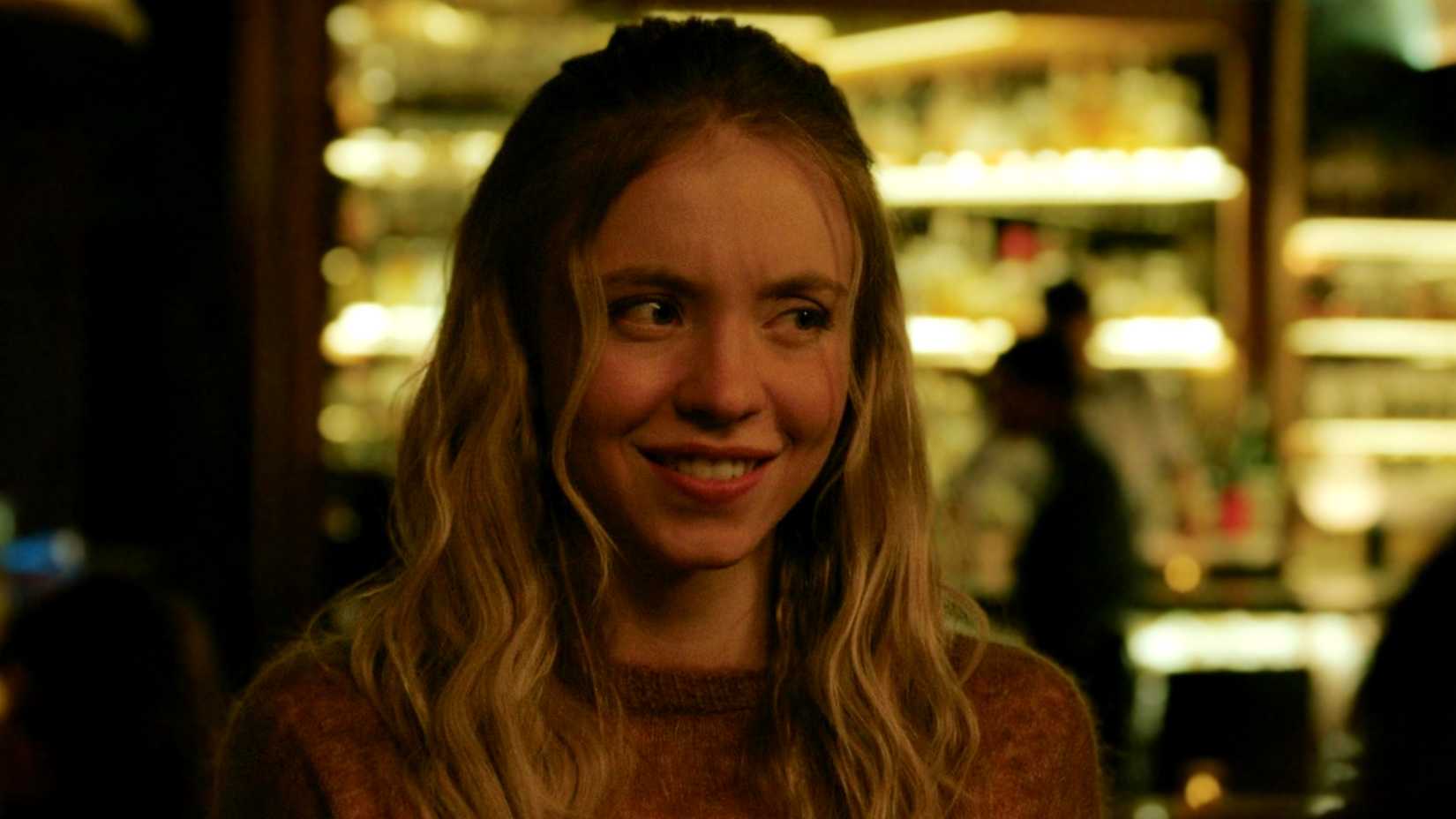Sydney Sweeney making a nonsense face in The Voyeurs