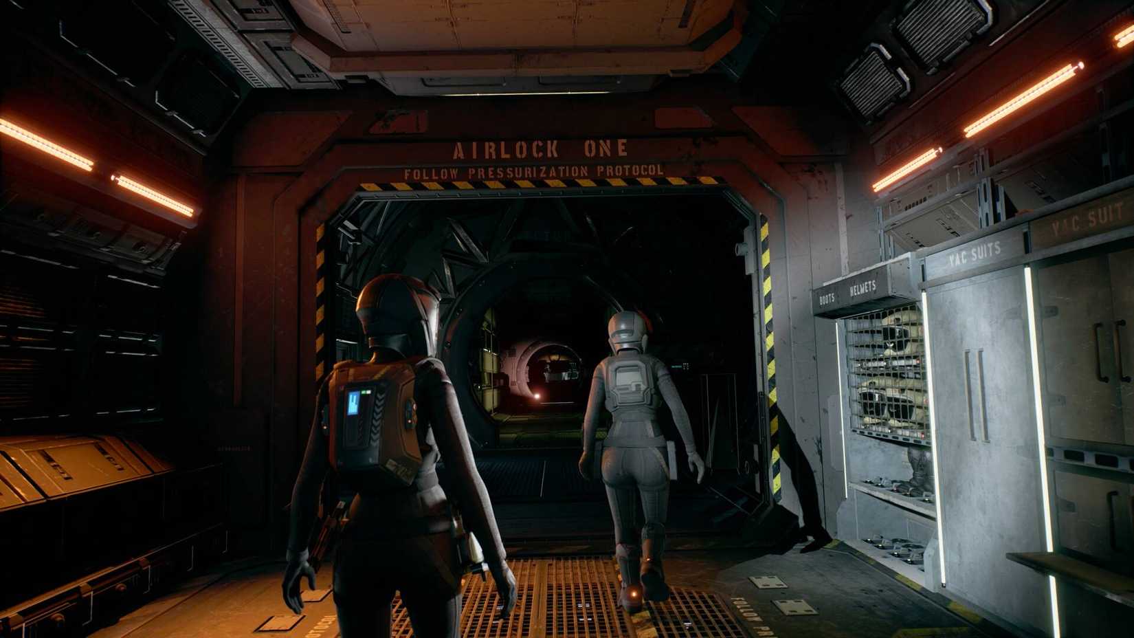 Two characters walking down a corridor in The Expanse A Telltale Series game.