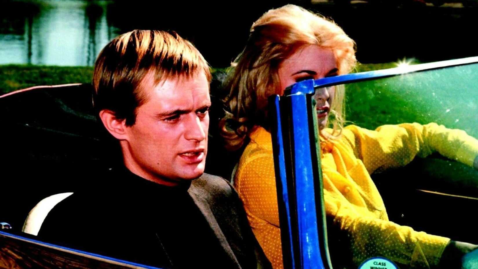 David McCallum as Illya Kuryakin driving in a car in The Man from U.N.C.L.E.
