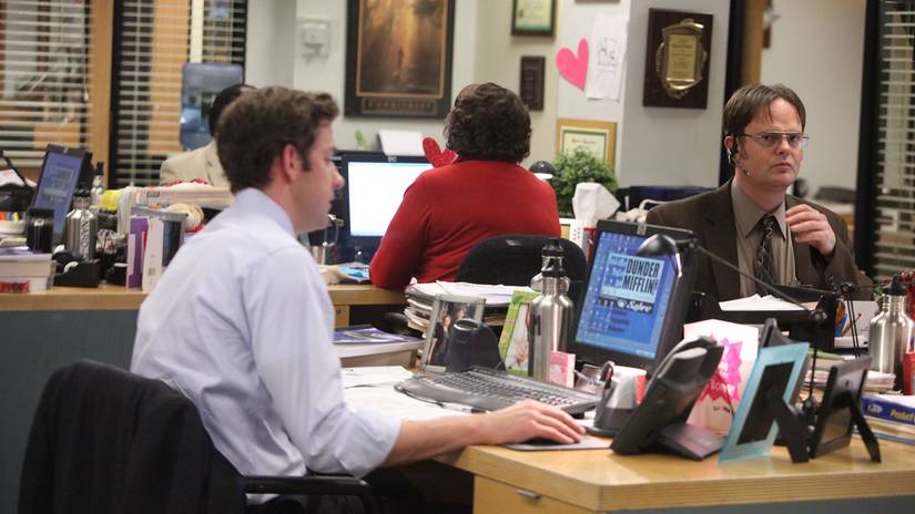 Jim (John Krasinski) and Dwight (Rainn Wilson) at their desk in The Office, PDA.