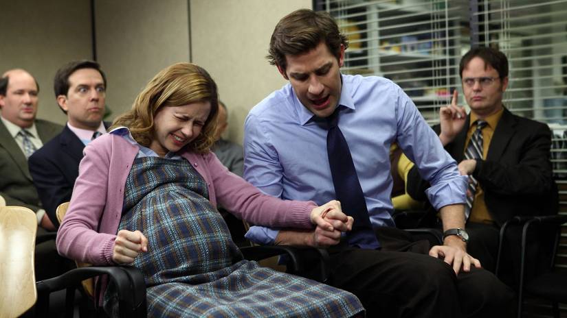 Jim (John Krasinski) holding Pam's (Jenna Fischer) hand as she has a contraction in The Office, The Delivery.