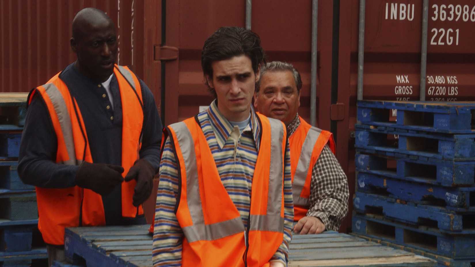 Ziggy (James Ransome) looking bored at work in the port in The Wire season 2.