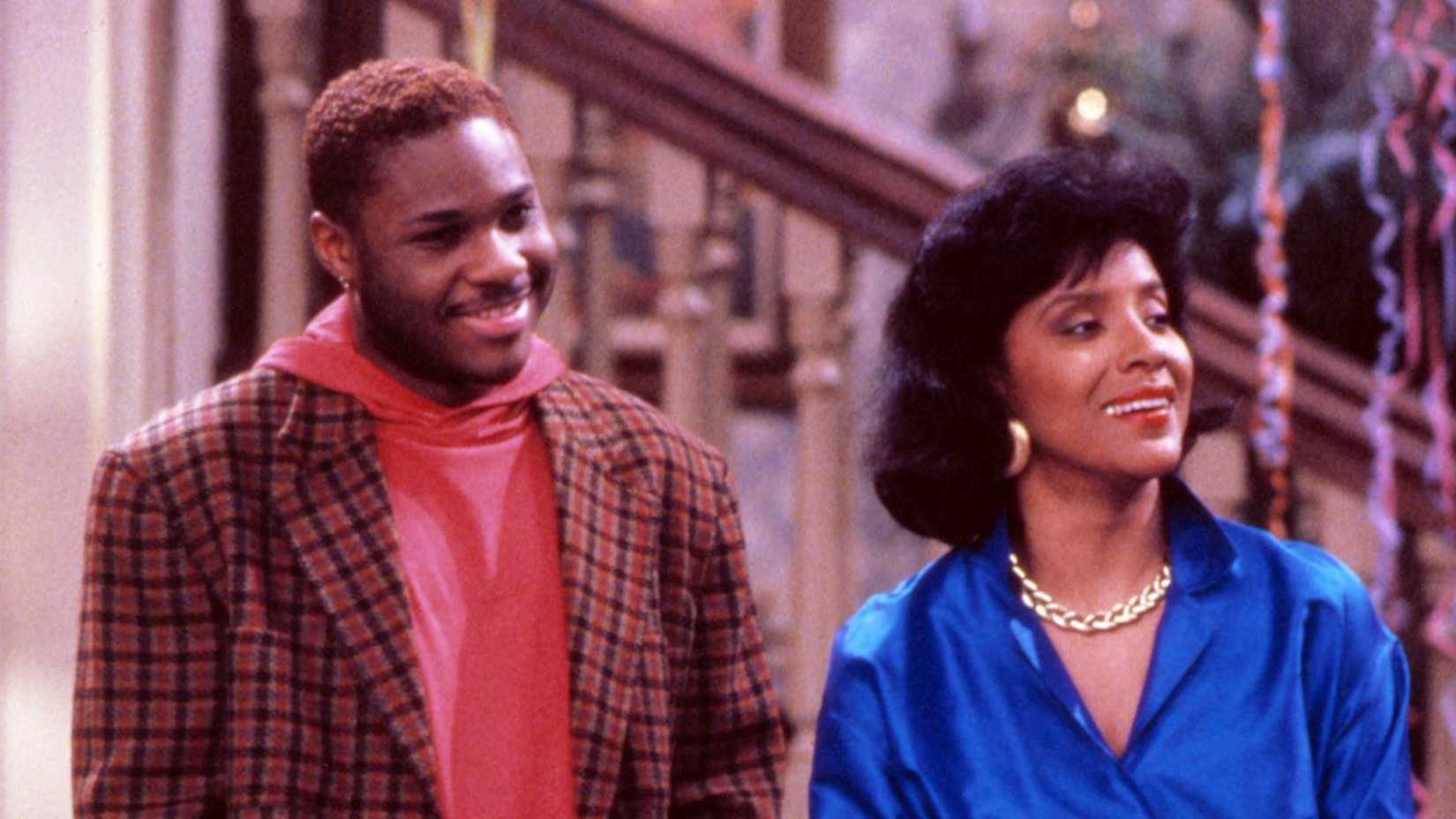 Theo and Claire smiling in The Cosby Show