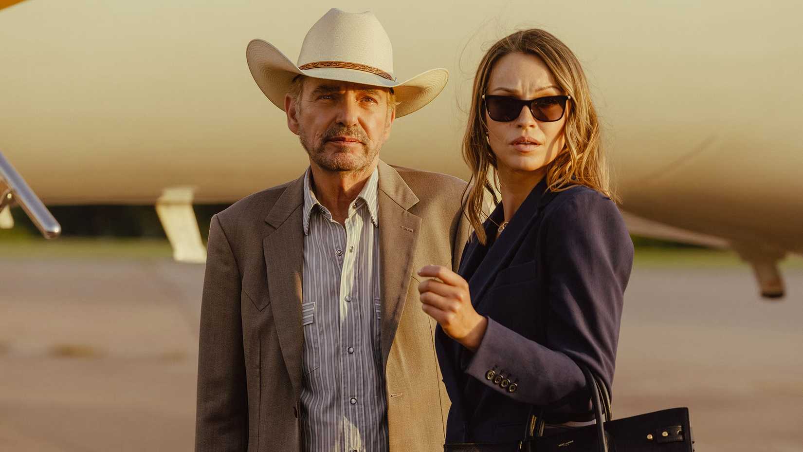 Tommy and Rebecca standing together in a still from Landman