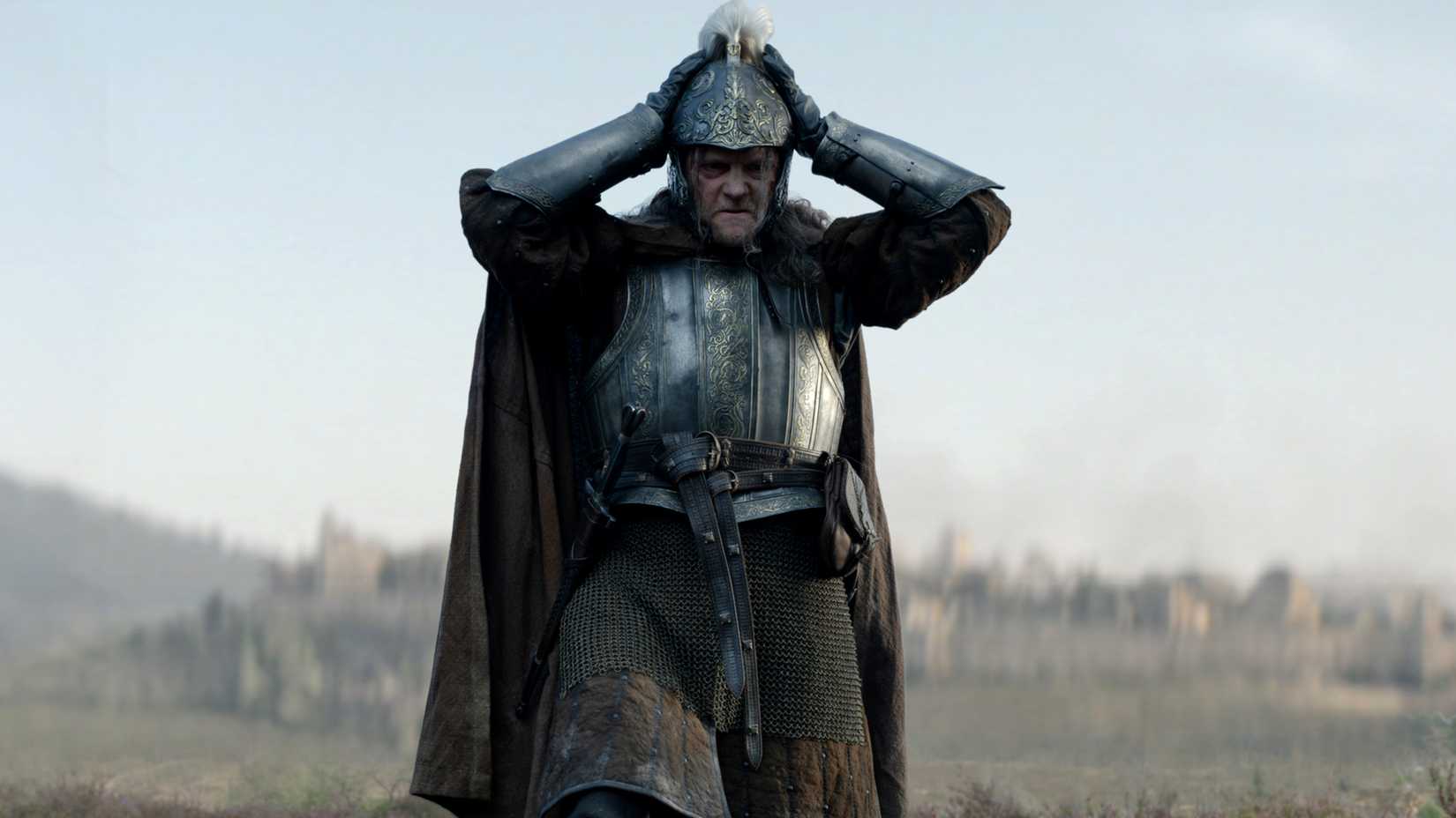 Ulf the White (Tom Bennett) putting on his helmet in House of the Dragon season 3 finale