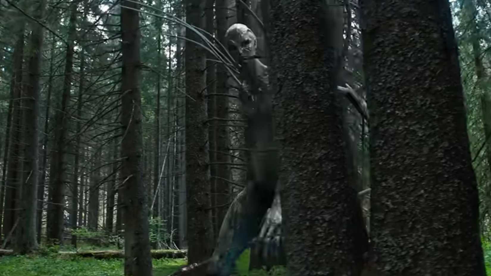 A still from the Hope trailer which shows the monster as it emerges from the trees