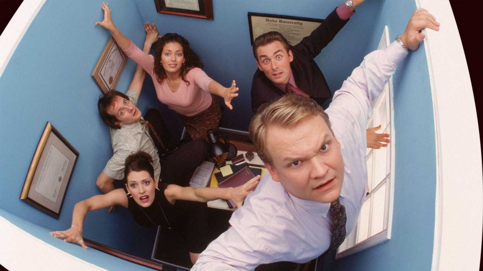 The cast of Andy Richter Controls the Universe in a confined space