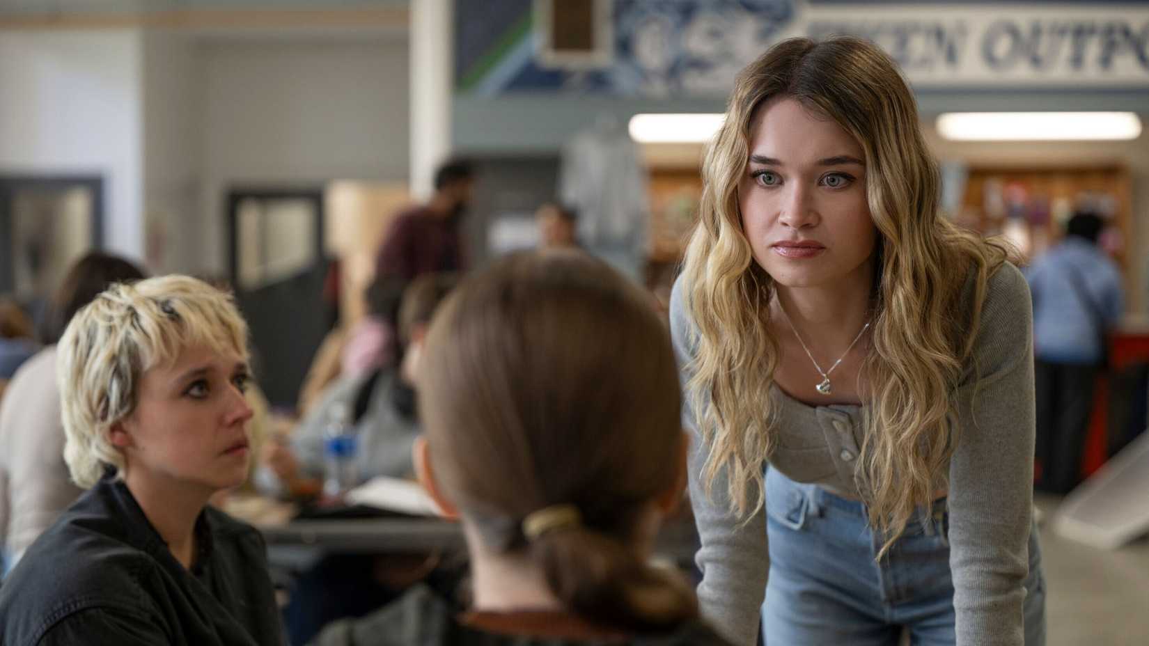 Chris Hargensen looking at a student while another looks at her