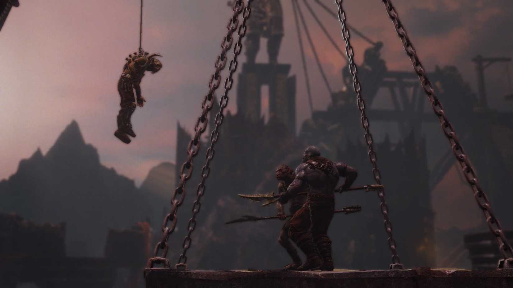 An orc suspended before two others in Middle-earth: Shadow of Mordor