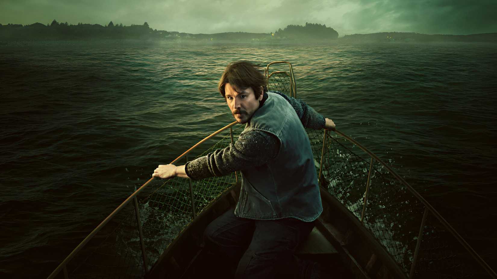 Josh Hartnett’s Calvin standing in a boat and looking back in Netflix’s Below