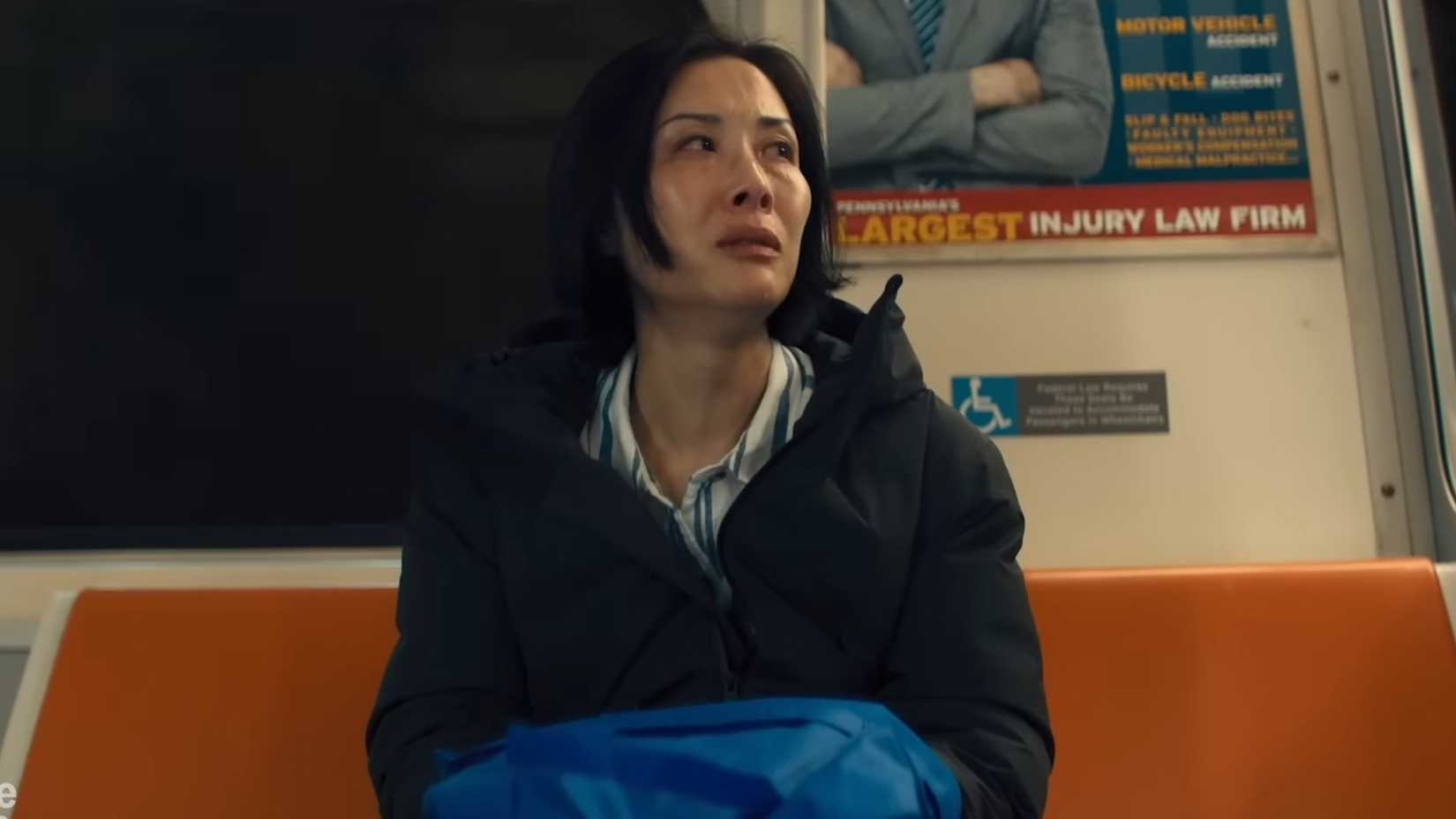 Karen Kwong-Chip‘s Anna Merrick with her hands inside a bag in Reacher season 4’s opening scene