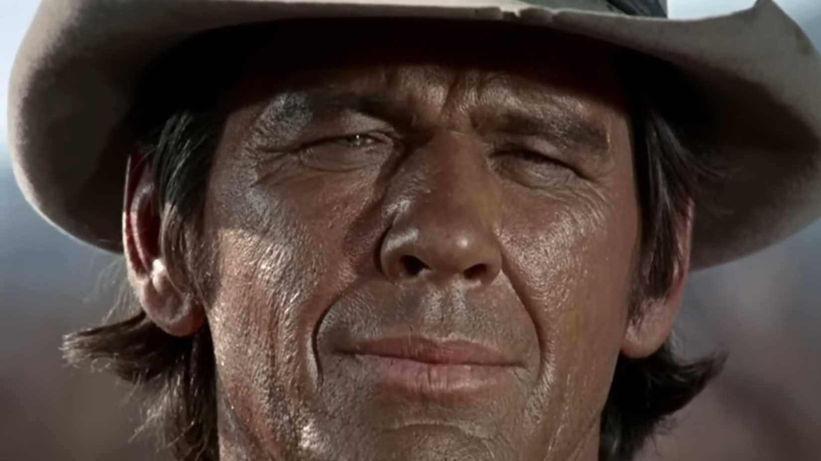 A close up of Harmonica in the final duel in Once Upon a Time in the West