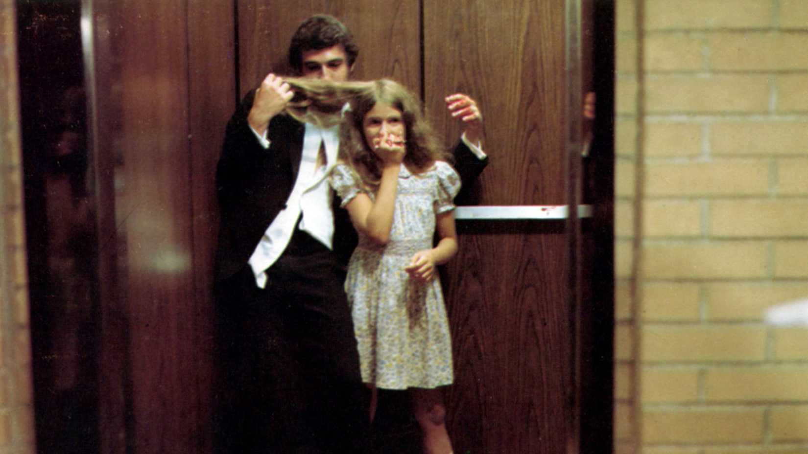 A couple in an elevator in Shivers