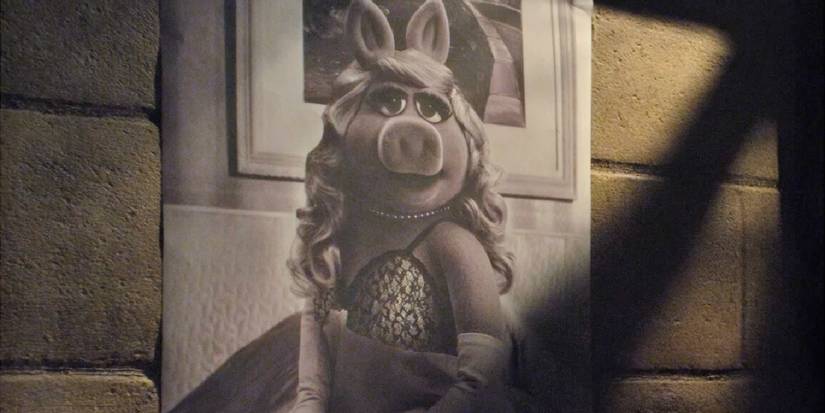 A Miss Piggy poster in Muppets Most Wanted